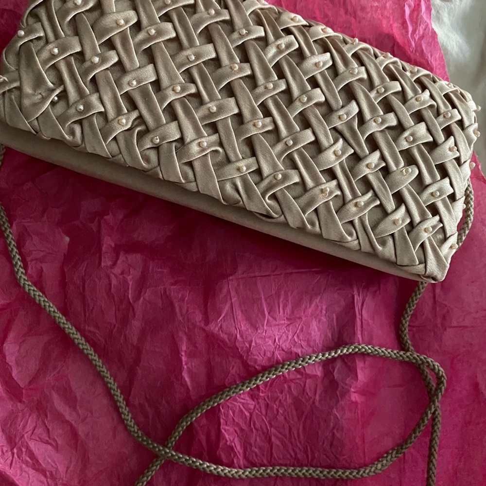 Taupe clutch with access to strap